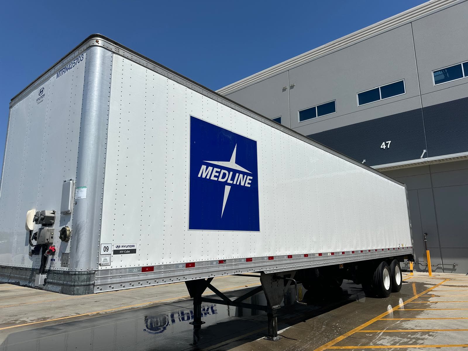 Washed Medline trailer at a loading dock